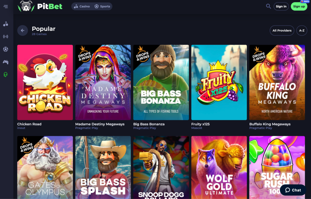 A screenshot of the Pitbet.io review slots lobby, featuring a sleek, dark design and a grid of popular slot games.